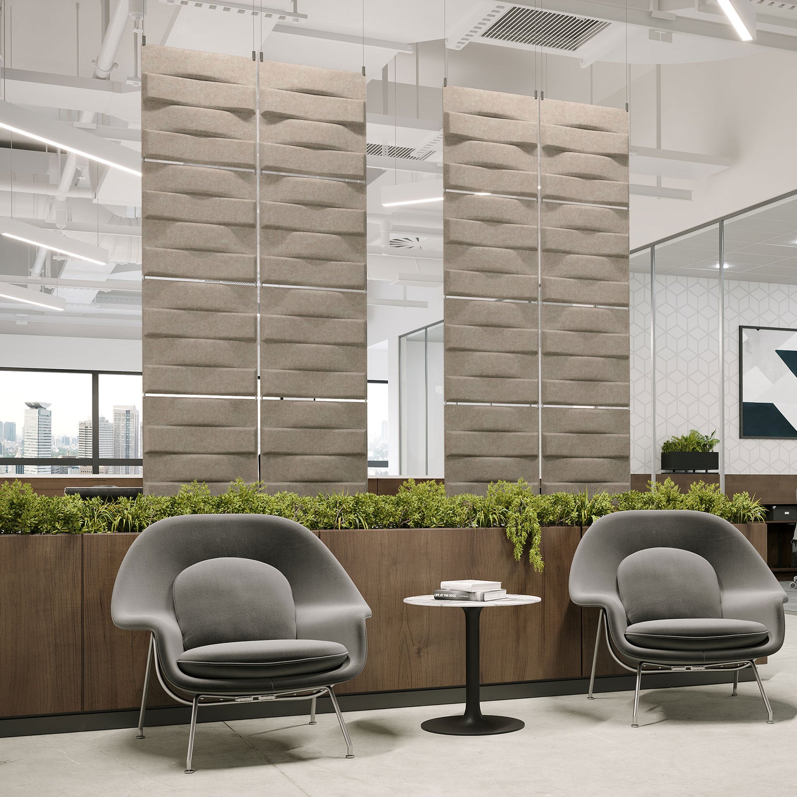 Taupe Stitch Harmony3D PET felt hanging acoustic panels dividing a modern office seating area