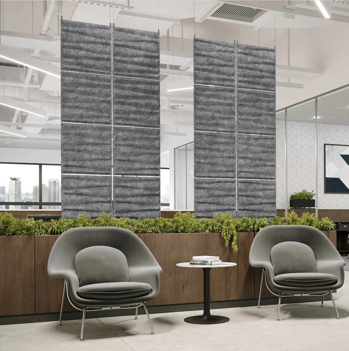 Drift Harmony3D hanging acoustic panels in Haze felt above a modern office lounge