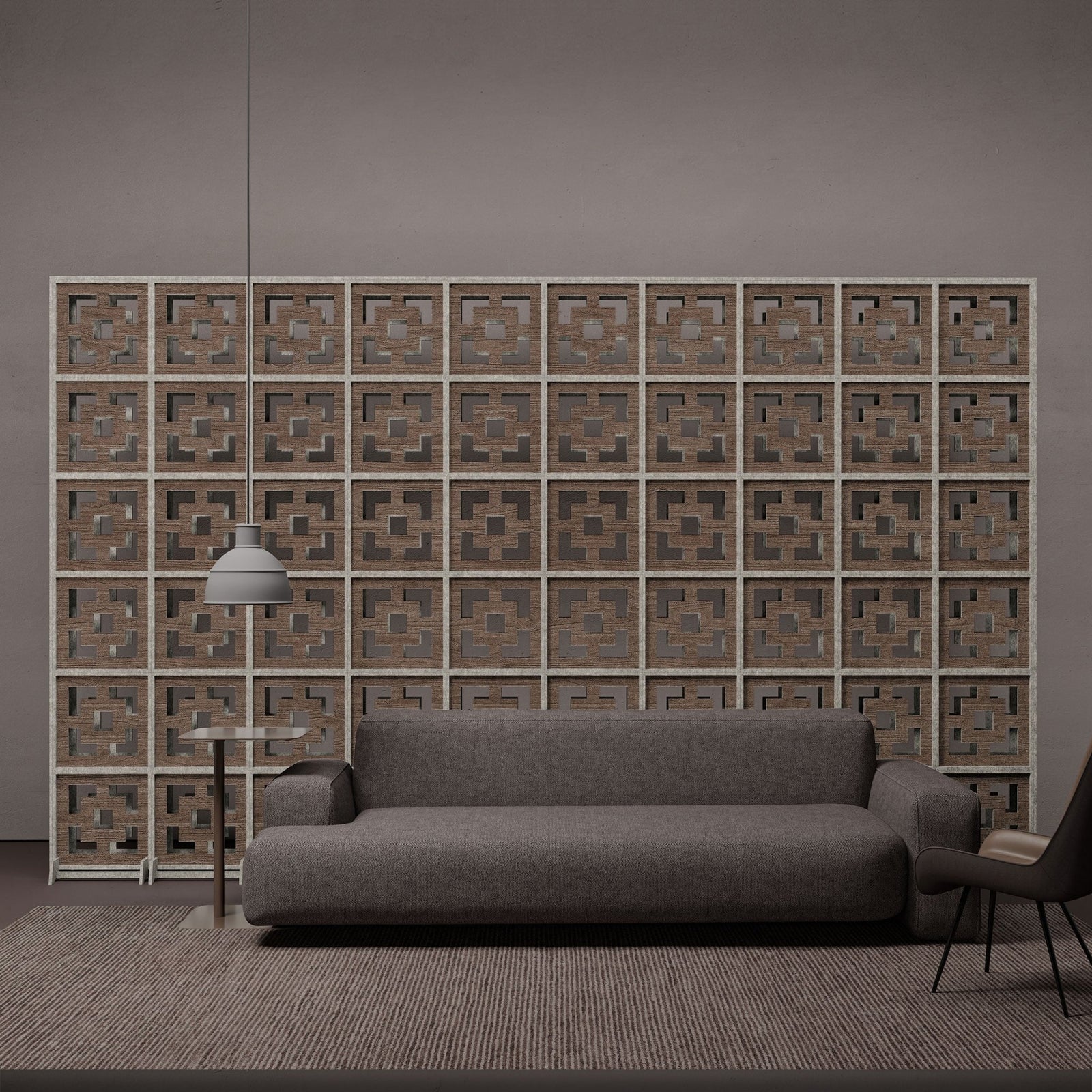 Dark wood Frame HarmonyBLOKS acoustic room divider behind lounge furniture