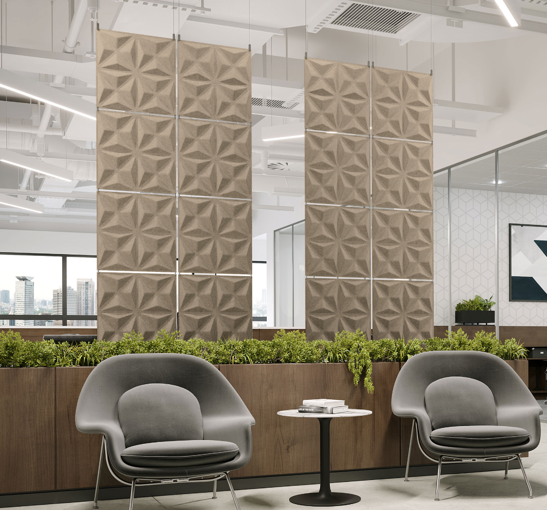 Harmony3D Hanging acoustic panels installed above an office lounge with seating and planters