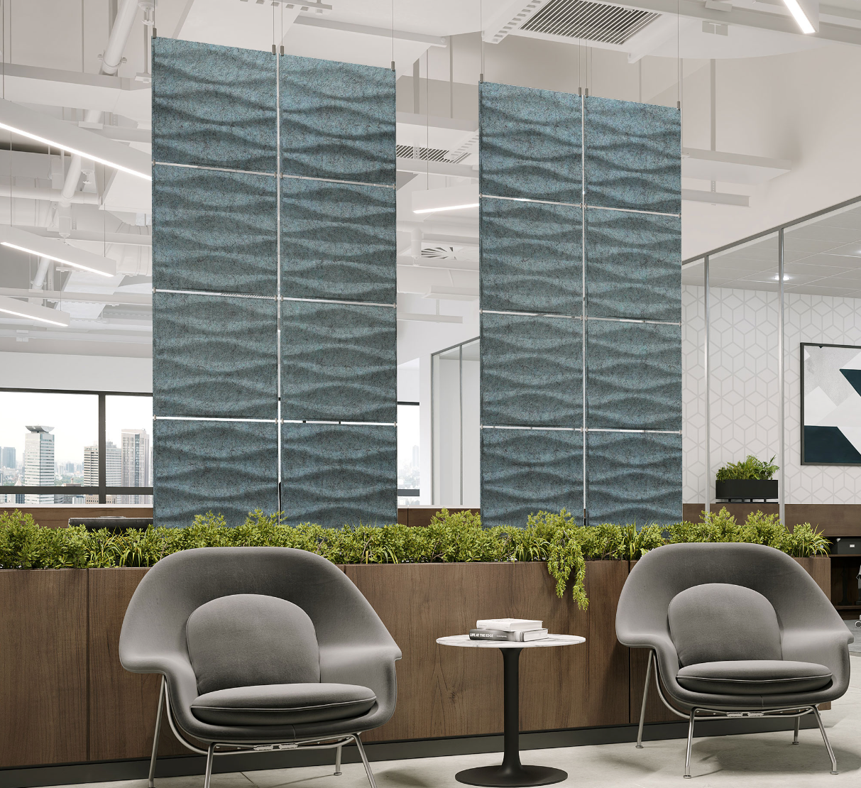 Origami Harmony3D acoustic felt hanging panels in Waterfall dividing an office seating area