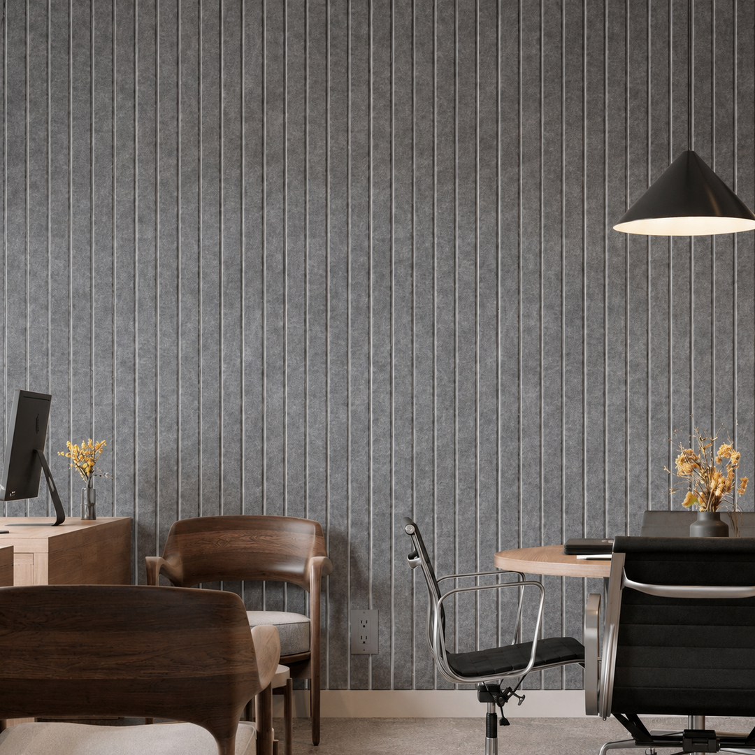 Close-up of Slats Wide HarmonyCARV acoustic felt wall panels installed in a modern interior