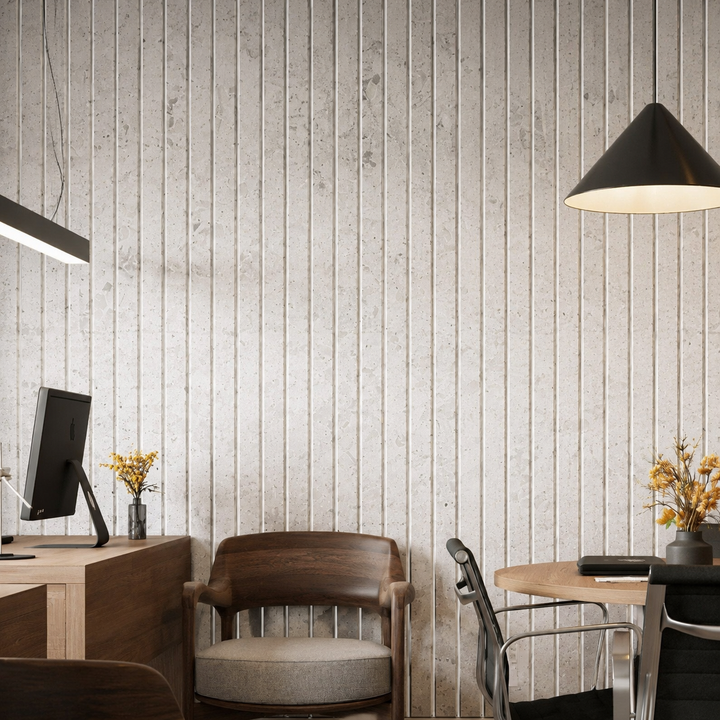 Close-up of Slats Wide Overlay HarmonyCARV acoustic felt wall panels installed in a modern interior
