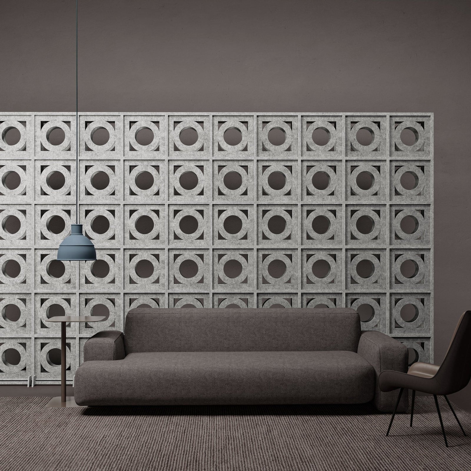 Gray Canopy HarmonyBLOKS PET felt acoustic room divider by Inhabit behind a sofa