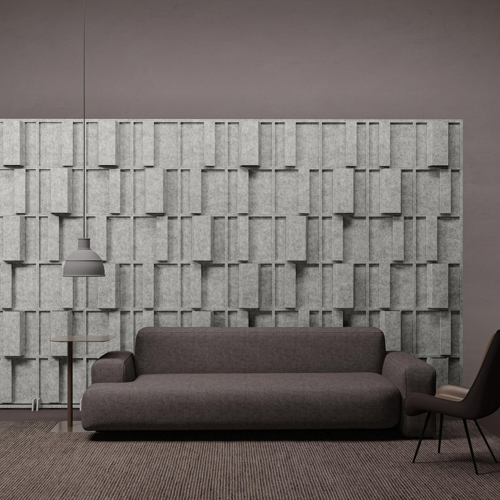 Hinge HarmonyBLOKS PET felt acoustic room divider behind a gray sofa by Inhabit.