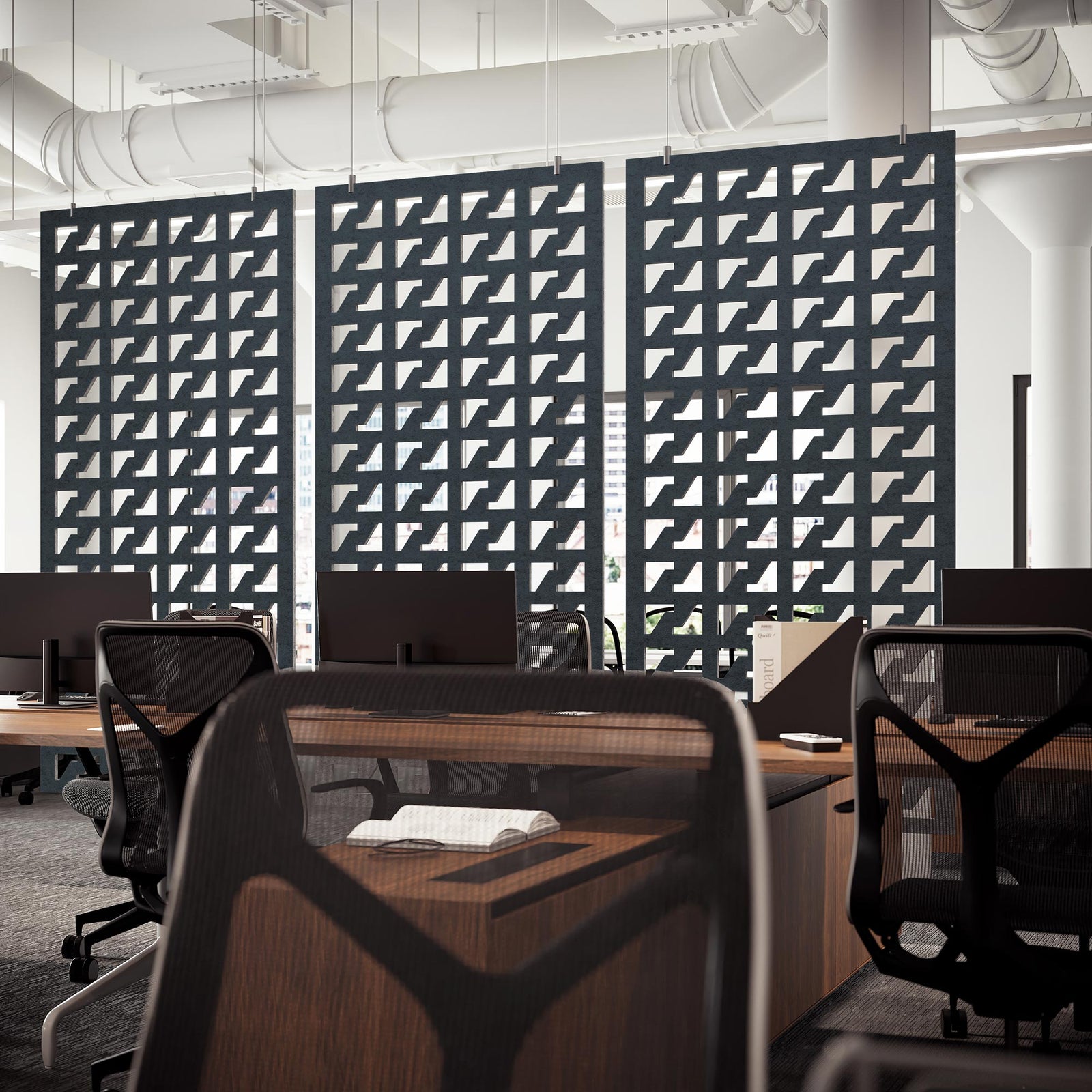 Houndstooth HarmonyDIVDR panels dividing workstations in an open office.