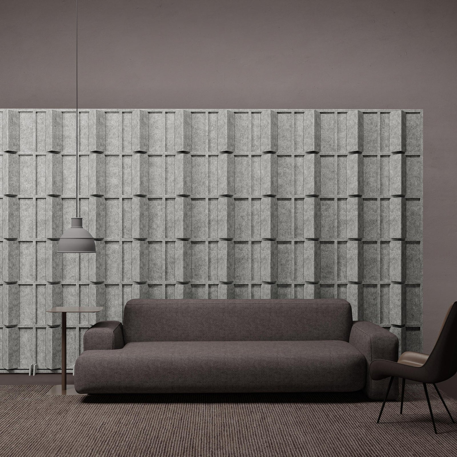 Pleat HarmonyBLOKS staggered felt divider wall in a modern lounge.